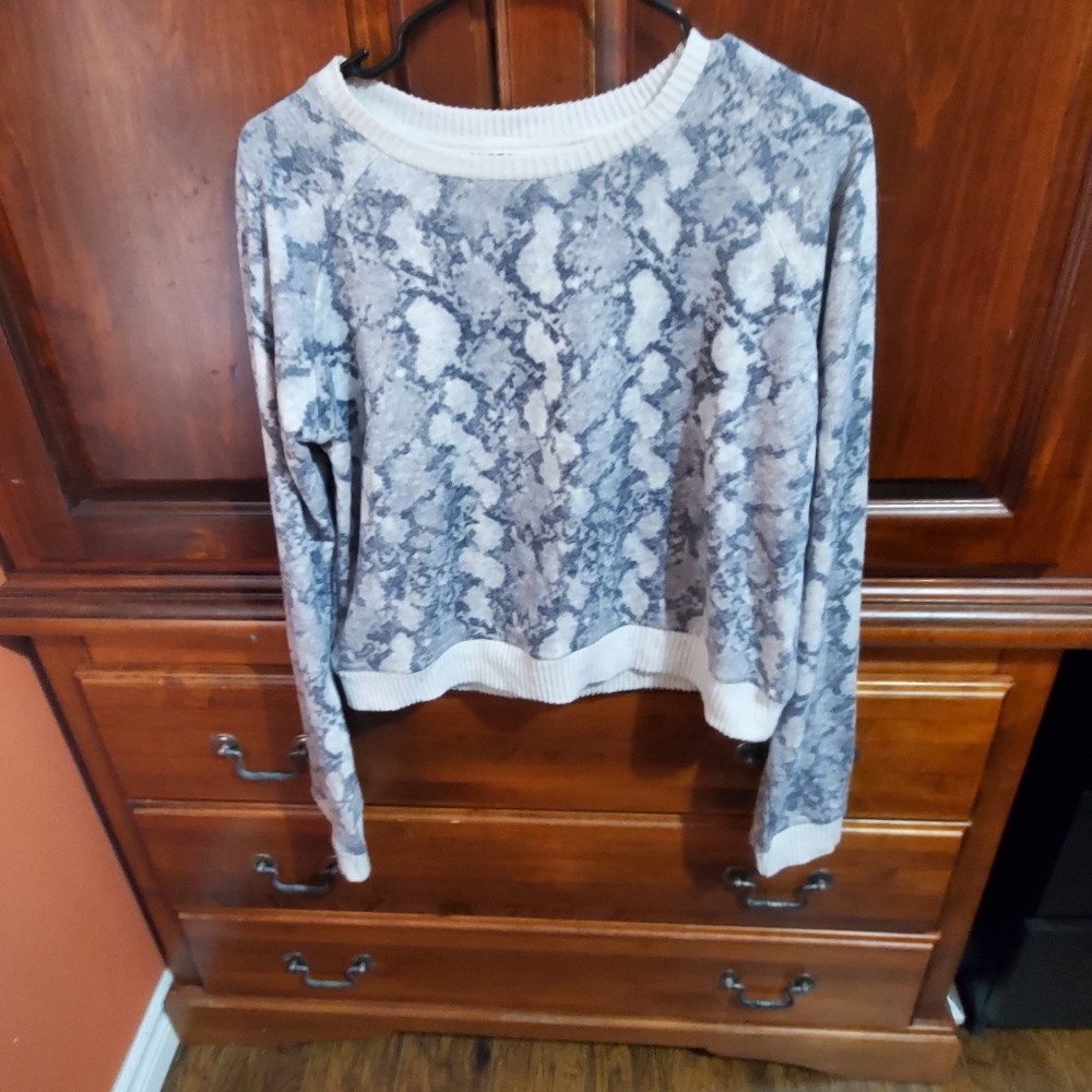 Gently used snake print sweater